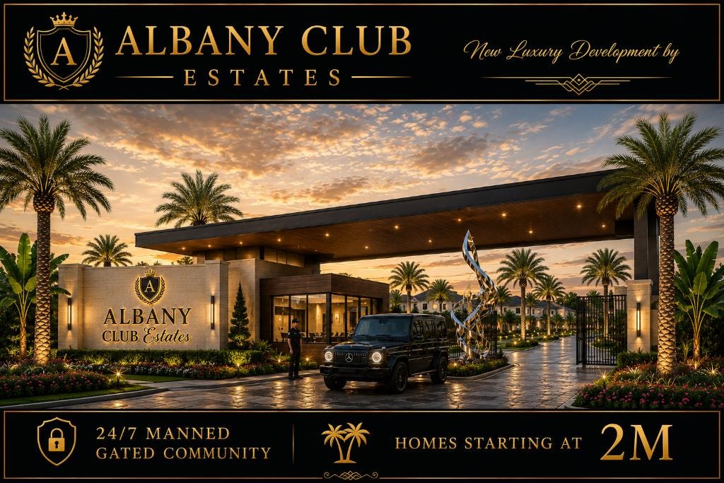 Albany Club Estates — grand gated entrance at sunset